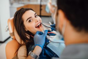 Young female patient visiting dentist office at Bite Club